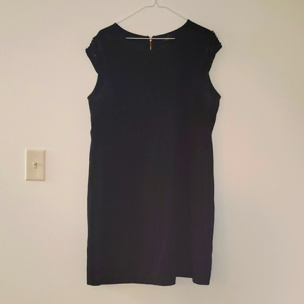 Size L black mini dress with sequined sleeves